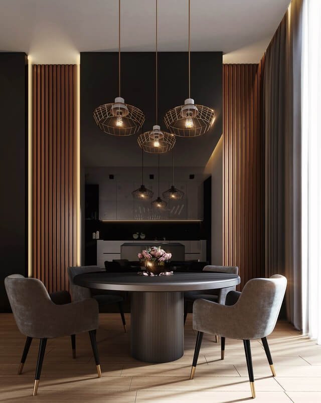 gray dining table under pendant lamps.jpg